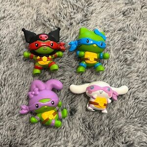 McDonald's Hello Kitty x Teenage Mutant Ninja Turtles Figures (4) Read
